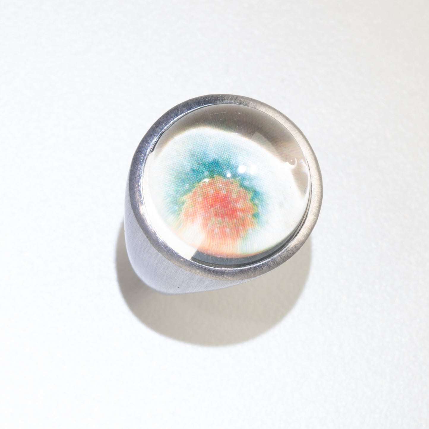 Eye drops silver ring with white rodium