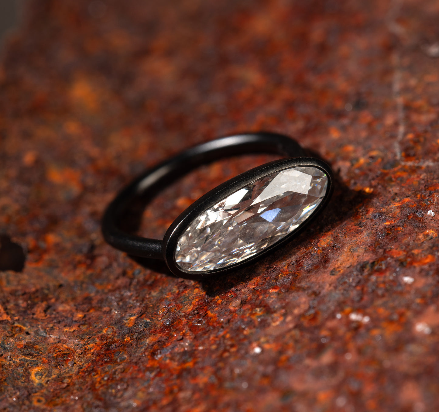 Quiet PLatinum Ring with oval-cut diamond