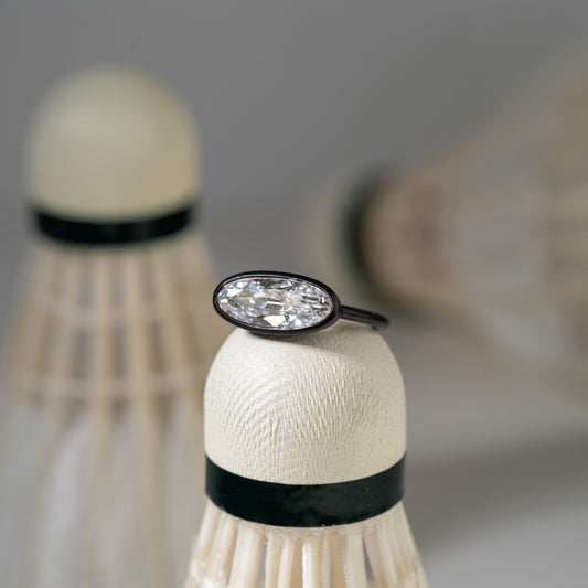 Quiet PLatinum Ring with oval-cut diamond