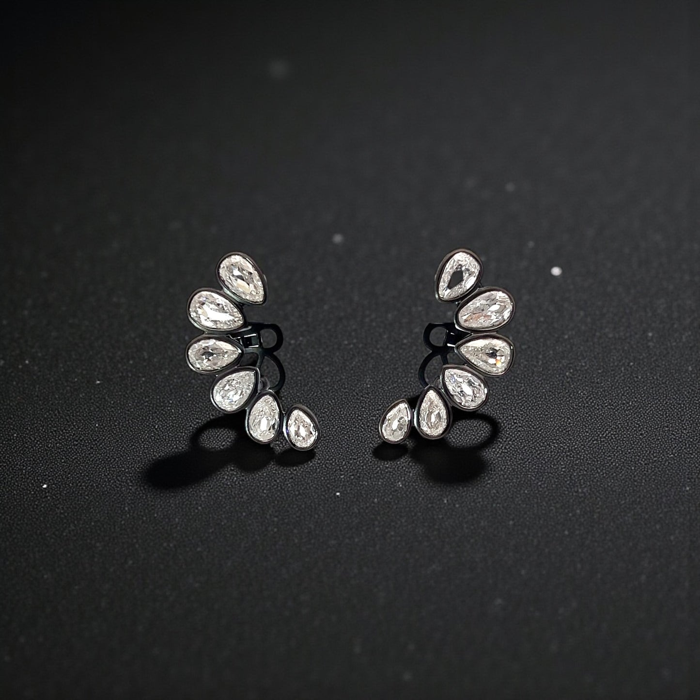 PLatinum Ear cuffs with pear brilliant cut diamonds
