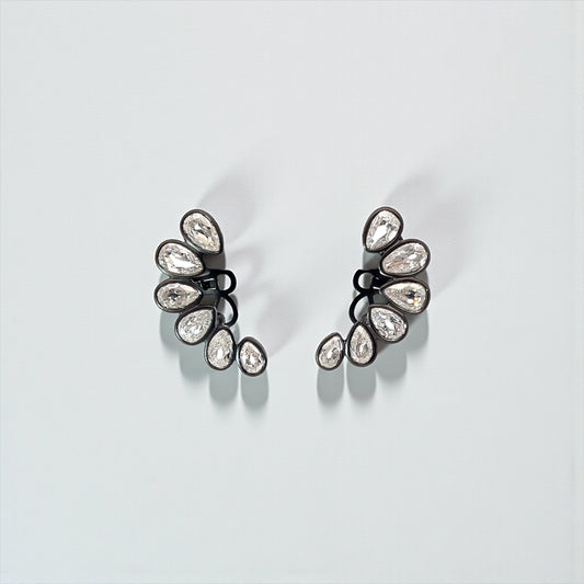 PLatinum Ear cuffs with pear brilliant cut diamonds