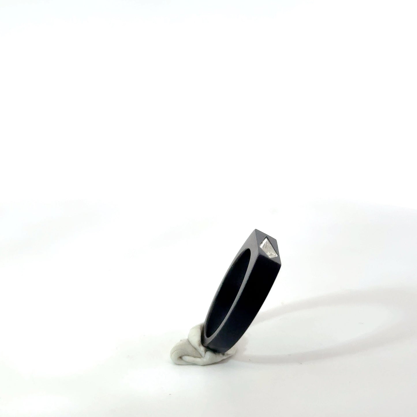 Quiet PLatinum Ring with kite-shaped diamonds