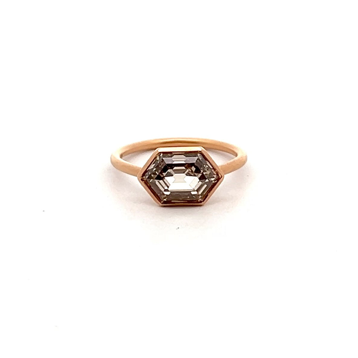 Quiet Gold Ring with hexagonal step-cut diamonds