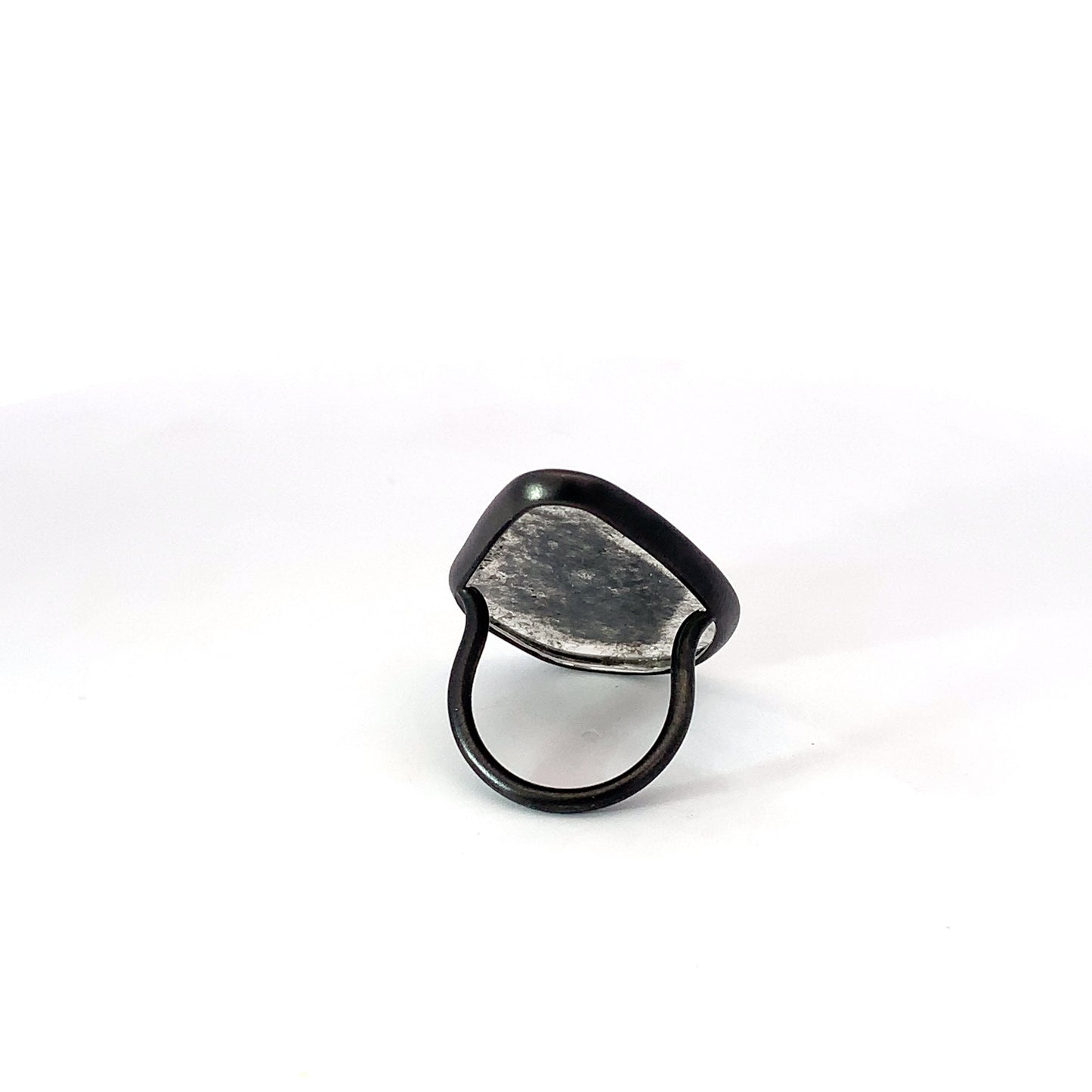 Quiet PLatinum Ring with pear-shaped tablet
