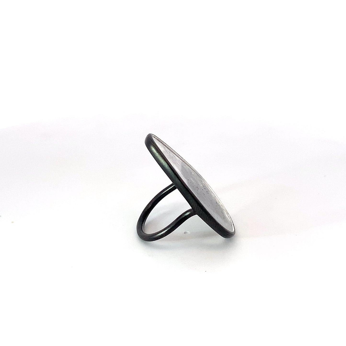 Quiet PLatinum Ring with pear-shaped tablet